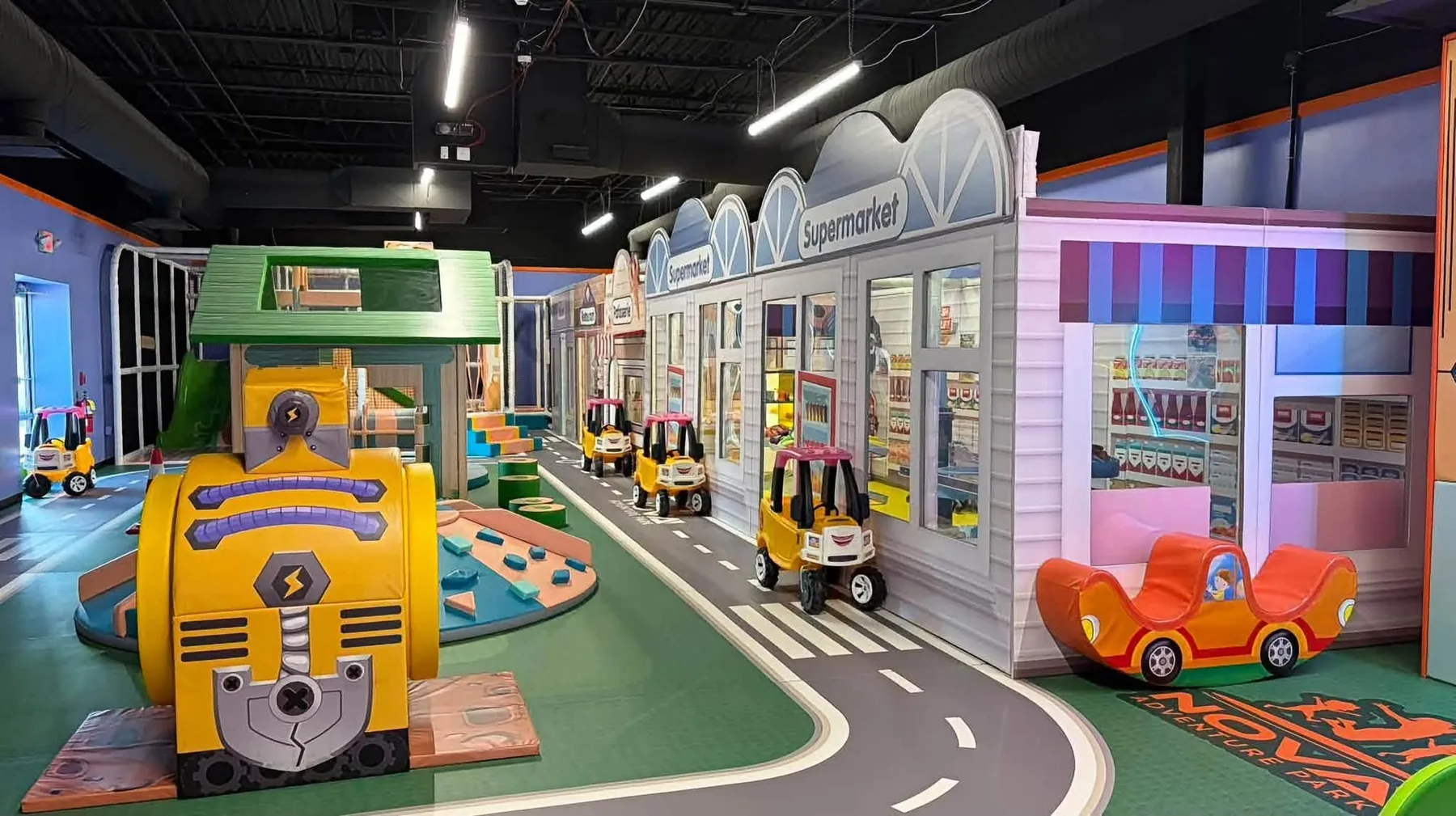 Mini Town road with ride-on cars at Nova Adventure Park Reading